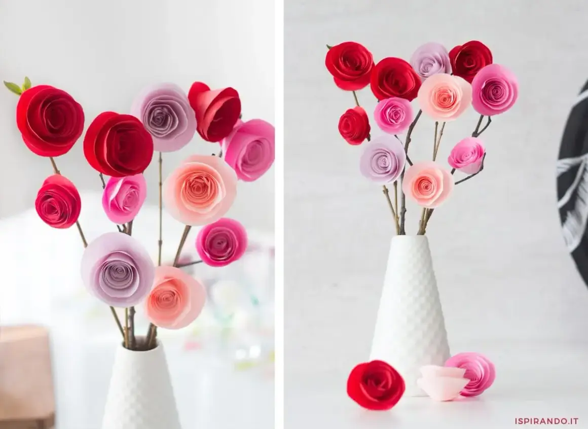 Un bellissimo lavoretto festa mamma: rose di carta rosse, rosa e lilla in un vaso bianco.