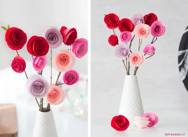Un bellissimo lavoretto festa mamma: rose di carta rosse, rosa e lilla in un vaso bianco.