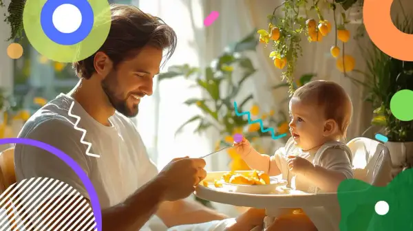 Padre sorridente nutre un neonato di 10 mesi seduto sul seggiolone, con cibo sul vassoio.